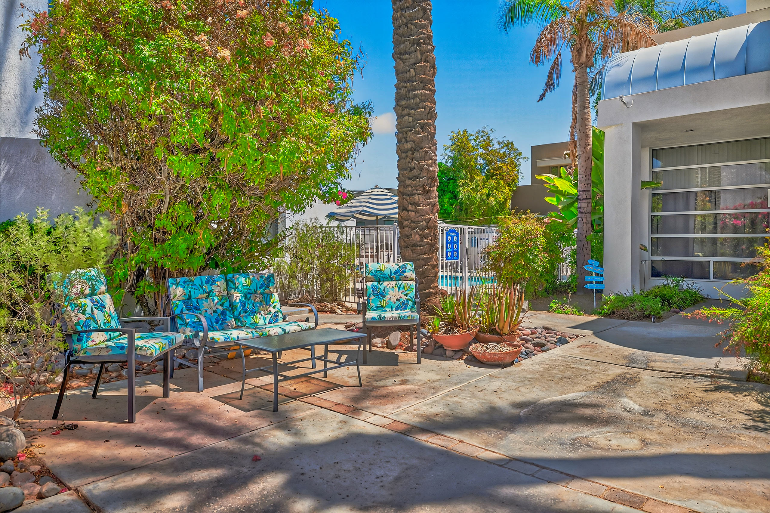outdoor 1 chairs in front of pool.jpg